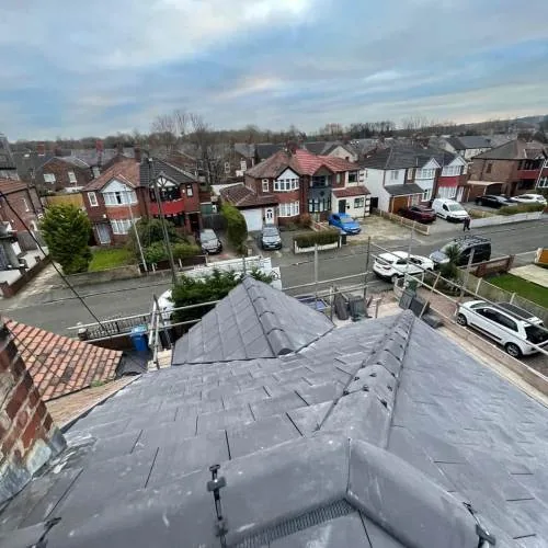 Completed grey hipped roof replacement