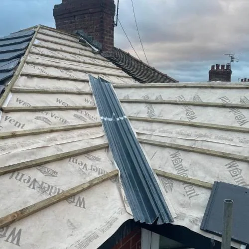 Hipped roof with new membrane, battens and dry ridge