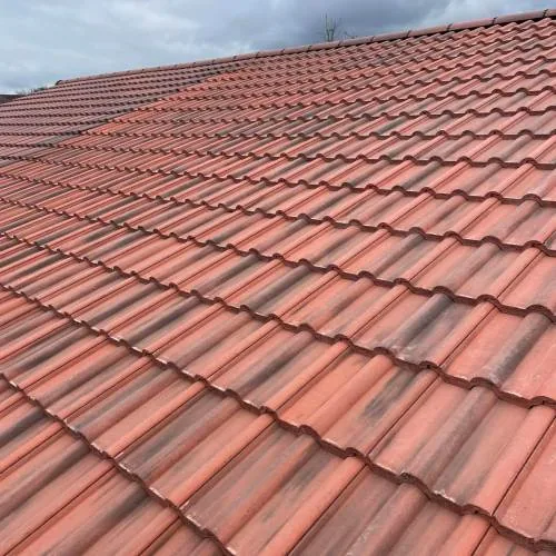 Close-up of new red concrete roof tiles